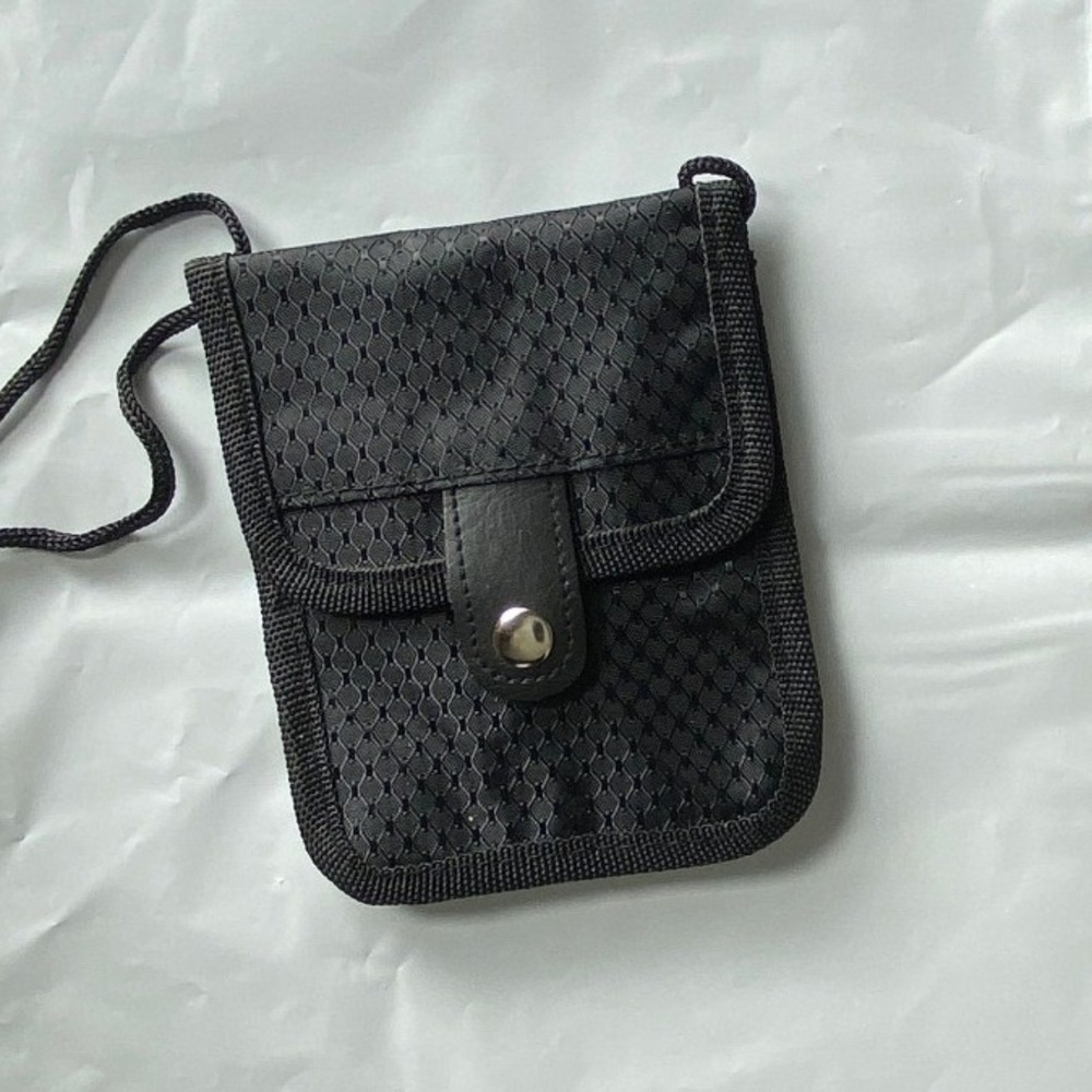 Black Perforated Mini Shoulder Bag with Adjustable Strap and Snap Closure‎